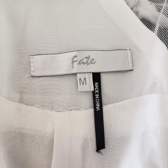 White dress with sheer cutouts and polka dots - Picture 4 of 4